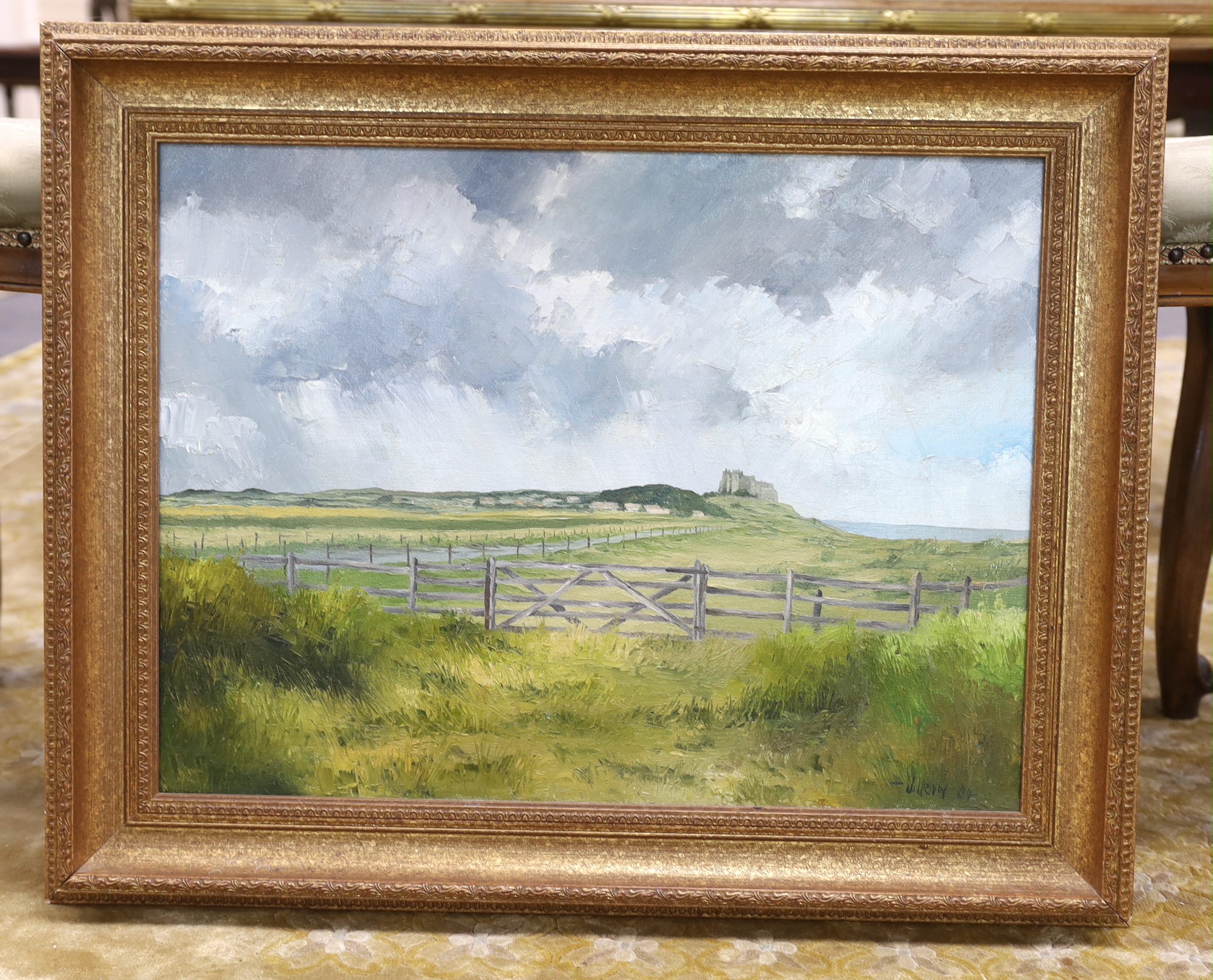 J. Urwin, oil on canvas, View of Bamburgh Castle, signed and dated '84, 45 x 60cm